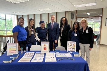 Mercy University School of Nursing students, faculty and staff along with White Plains Mayor Thomas M. Roach 