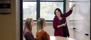 Students and a professor in a classroom