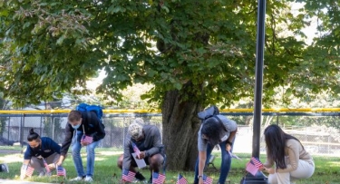 Students planting flags