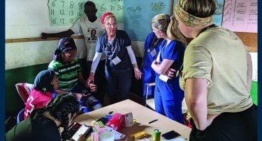 Students in Gambia providing health care services