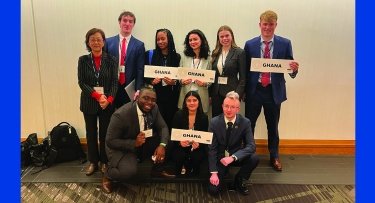 Mercy's Model UN team of students and professor 