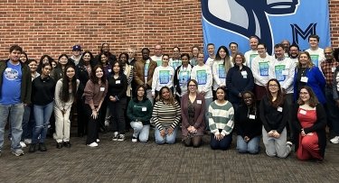 Regeneron volunteers pose with Mercy University students