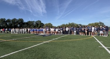 Mercy University students, faculty and staff gather at Mercy Field in the Westchester Campus to remember the attacks on September 11, 2001.