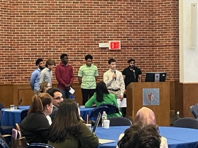 STEM Ready Summer Research Institute students presenting their research