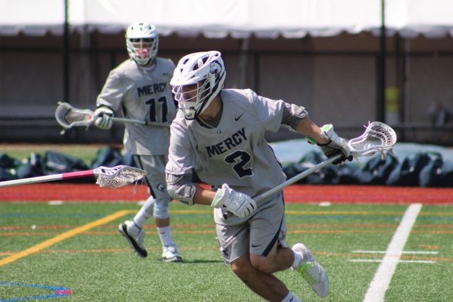 Mercy University men's lacrosse team on the field