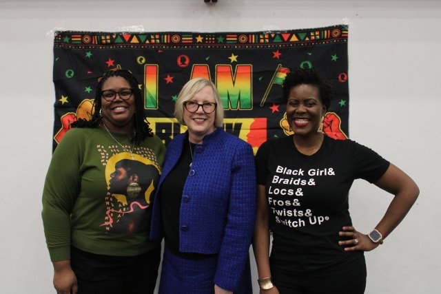 Mercy University President and staff with poet Jaylene Clark Owens