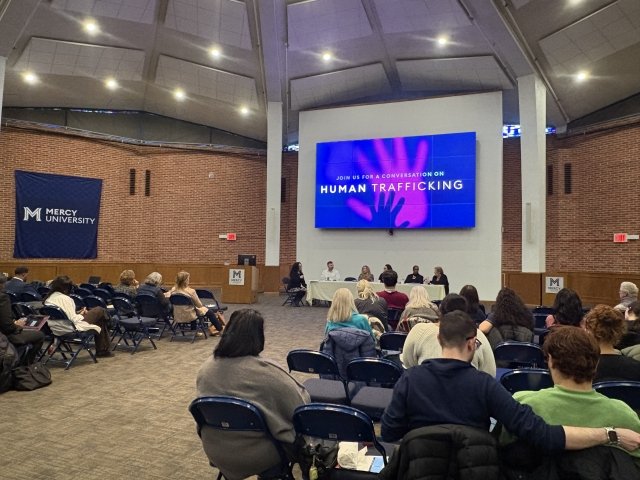 View of the audience during the afternoon panel discussion on human trafficking held at Mercy University's Rotunda. Westchester Campus 